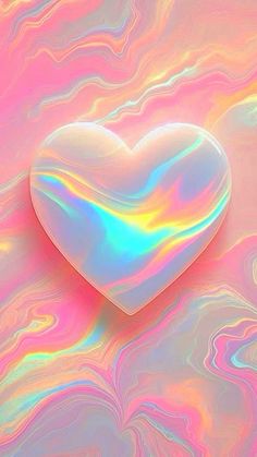 a heart shaped object sitting on top of a colorful background