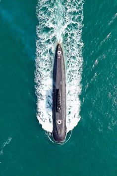 an aerial view of a submarine in the ocean