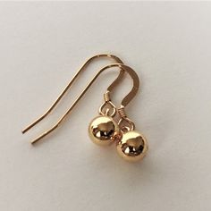 18ct Gold over Sterling Silver Sphere Ball Drop Earrings material: 18ct gold over sterling silver. Classic Polished Dangle Earrings, Gold Jewelry With Ear Wire For Anniversary, Gold Round Earrings For Everyday, Gold Hoop Earrings For Formal Events, Yellow Gold Hypoallergenic Earrings For Gift, Hypoallergenic Yellow Gold Earrings Gift, Yellow Gold Drop Earrings Gift, 14k Gold Ear Wire Earrings For Anniversary, Classic Gold Earrings For Everyday