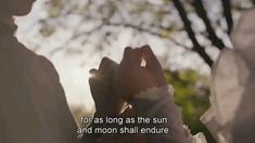 two people standing next to each other with the words for as long as the sun and moon shall entru