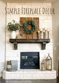 a fireplace decorated with wreaths, candles and other items on top of the mantle