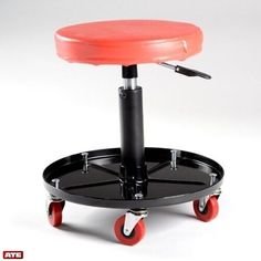 a black and red stool with wheels on it