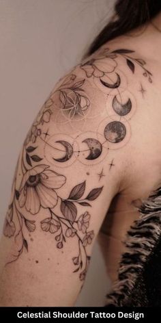 a woman's shoulder tattoo with flowers and circles on the back of her arm