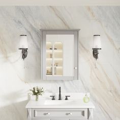 a bathroom with marble walls and flooring, two lights on the wall above the sink