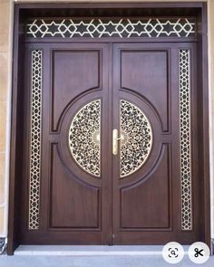 a wooden door with intricate carvings on it