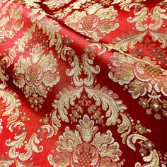 red and gold brocaded fabric