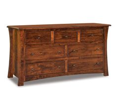 a wooden dresser with many drawers on it