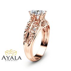 a rose gold engagement ring with an intricate design