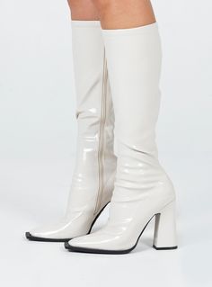 Knee high boots    Princess Polly Exclusive  Upper: 100% PU  Lining: 100% Textile  Outsole: 100% TPU  Faux patent leather   Zip fastening at side   Pointed toe   Block heel   Heel height: 11cm / 4.3in Long Leather Boots, Off White Shoes, Exclusive Shoes, Outerwear Outfit, Knee High Leather Boots, White Boots, Long Boots, Heeled Loafers, Winter Accessories