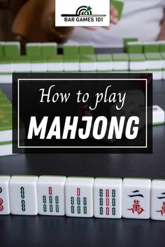 the words how to play mahjong are in front of some dices