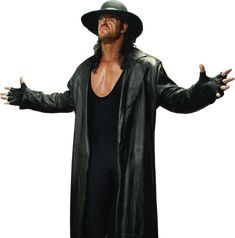 a man in a black outfit and hat with his hands out to the side,