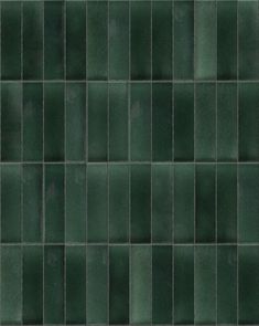 an image of a green tile wall that is very dark and blurry in color