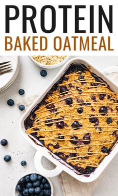 blueberry protein baked oatmeal in a baking dish with the title above it