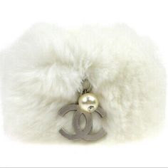 White Real Rabbit Fur Chanel Cuff Bangle In A Cream Color And Chanel Charm Luxury White Bracelets For Parties, Chanel Charm, Chanel Cuff, Pearl Charm Bracelet, Jewelry Chanel, Chanel Jewelry, Bracelet Cuff, Pearl Charms, Cuff Bangles