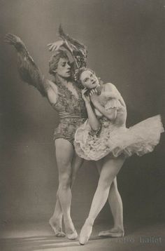 two ballerinas are posing for the camera