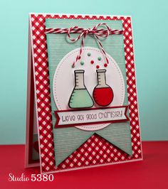 a card with two flasks on it and the words, we love you and christmas