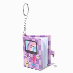 a book shaped like a keychain with a cartoon character on it's cover