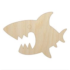 a wooden cutout of a shark with its mouth open