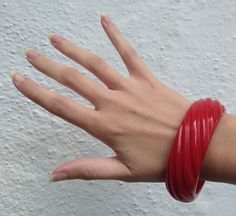 "This vintage cherry red Bakelite bangle measures approximately 2-9/16\" (6.6 cm) across the inside and 13/16\" (2.1 cm) in width. Weighs 53.7 grams. This has been tested positive for Bakelite with Simichrome. Good condition." Bakelite Bangles, Vintage Cherry, Enamel Bangle, Turquoise Bracelet Cuff, Vintage Bakelite, Turquoise Cuff, Bracelet Cuff, Photo Bracelet, Cat Pin