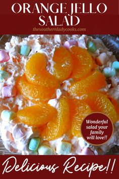 an orange jello salad with marshmallows and candies on top is featured in this recipe