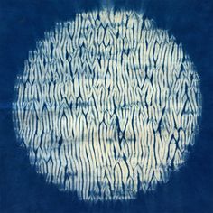 an abstract painting with blue and white colors