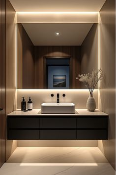 Modern bathroom vanity with recessed and under-cabinet lighting Smallest Bathroom Ideas, Under Vanity Lighting, Bathroom Cabinet Lighting, Bathroom Floating Vanity Ideas, Half Bathroom Inspiration, Bathroom Vanity Lighting Over Mirror, Vanity Ideas Bathroom, Woodland Bathroom, Smallest Bathroom