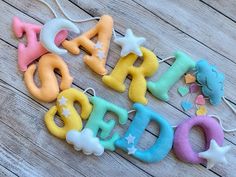 Add a fun, pastel rainbow-themed touch to your child’s room, party, or celebration with this Personalized Felt Name Banner! Perfect as room decor, party decor, a baby shower gift, birthday present, or photo prop, this customizable felt garland is an ideal way to celebrate a little one’s love for rainbows. Felt Name Banner, Rainbow Wall Art, Rainbow Decorations, Felt Garland, Baby Name Signs, Name Banners