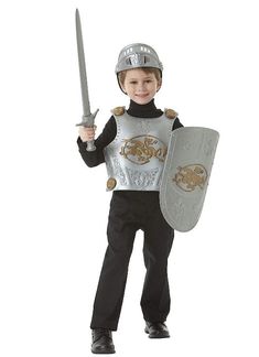 Give your child's knight costume an authentic look. This Medieval Knight Crusader Set (28-1/2" X 17") in silver and gold safe plastic comes in a child's size and will fit most kids from 4 to 10 years of age. The helmet is lightweight, comfortable to wear and features a flip up face cover on the mask. There is dragon detailing on the chest plate and shield. Other Medieval and knight costumes and accessories are sold separately on our page - subject to availability. Perfect for school plays and pr Costume Chevalier, Dress Up For Boys, Knight Party, Medieval Shields, Knight Costume, Knights Helmet, Battle Armor, Knight In Shining Armor, Knight Armor