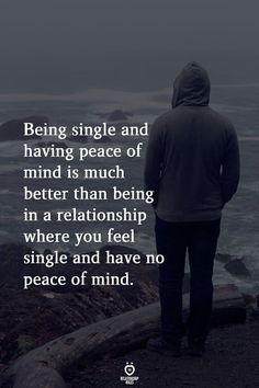 a man standing on top of a cliff near the ocean with a quote about being single and having peace of mind is much better than being in a