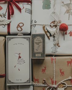 christmas presents wrapped in brown paper and tied with twine bows, are sitting next to each other