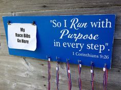 a blue sign that says so i run with purpose in every step