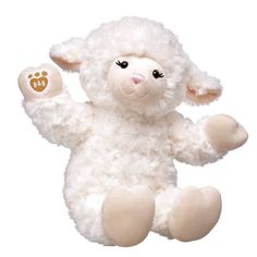 a white stuffed animal with brown feet and eyes on it's back legs, sitting in front of a white background