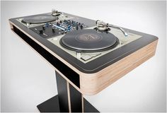 a turntable that is sitting on top of a table