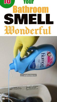 a person in yellow gloves is pouring blue liquid into a white sink with the words 10 ways to clean your bathroom smell wonderfully