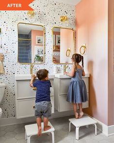 two children are playing in the bathroom while one boy sits on a stool and another stands up