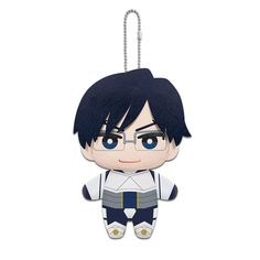 an anime character keychain with glasses on it's face and black hair