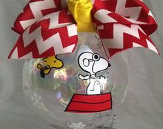 a glass ornament with a cartoon character on it