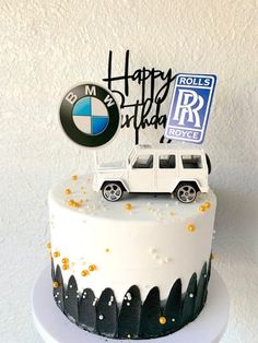 a birthday cake with a white car on top