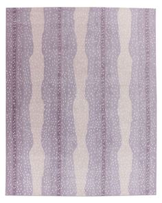 a purple rug with white stripes on it