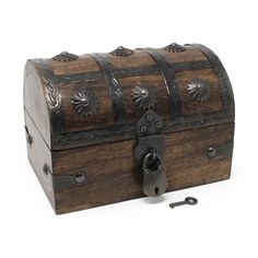 an old fashioned wooden chest with metal decorations on the lid and latch, is shown