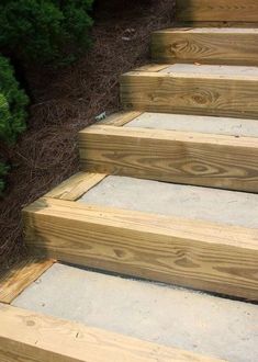 the steps are made out of wood and cement