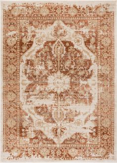 an orange and beige area rug with ornate designs on the center, in front of a white background