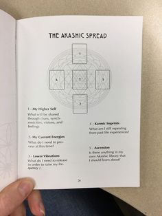 the akashic spread book is open to show instructions