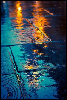 an image of rain on the ground in the street with caption that reads, let's go to bed today