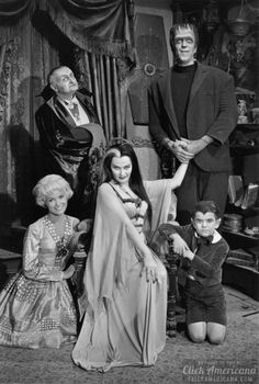 an old black and white photo of the addams in their living room with two children