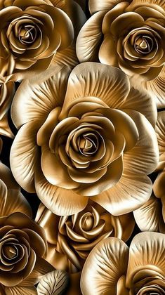 some very pretty gold flowers in the middle of a wallpaper pattern with black and white background