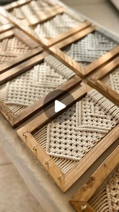 an image of a table that is made out of wood and wicker with a video playing on it