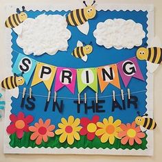 a card with some bees on it and the words spring is in the air