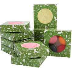 several green boxes with different designs on them