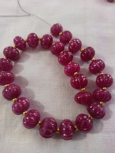 Ruby Pumpkin Natural Ruby Corundum Carving Pumpkin Beads Round Beads Gemstone String 1.Ruby Pumpkin shape 2. Ruby Corundum 3. 112 -carat weight - Approx -11 mm Size - 3.5 inch 9 piece String 4. 170 -carat weight - Approx - 10 mm Size - 6.5 inch 19 piece String 5. 167 -carat weight - Approx - 9 mm Size - 8 inch 25 piece String 6. 169 -carat weight - Approx - 8 mm Size - 10 inch 30 piece String 7, The necklace is with tassel because you can easily adjust your necklace length. 8. If you want any ch Elegant Round Spacer Beads, Festive Beaded Necklaces With Round Beads, Artisan Round Spacer Beads, Ruby Rondelle Polished Beads Jewelry, Festive Spacer Beads, Round Shape, Ruby Rondelle Jewelry With Polished Beads, Festive Faceted Oval Beads, Polished Round Beads For Jewelry Making, Festive Oval Faceted Beads